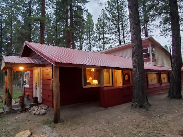 4056 Snow Fleury Ln, Lincoln, MT 59639 - rear view of house featuring metal roof