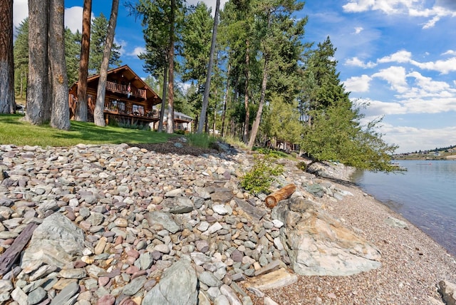 662 S Foys Lake Dr, Kalispell, MT 59901 - view of yard with a water view