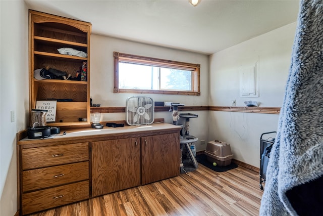 office featuring light wood finished floors and baseboards