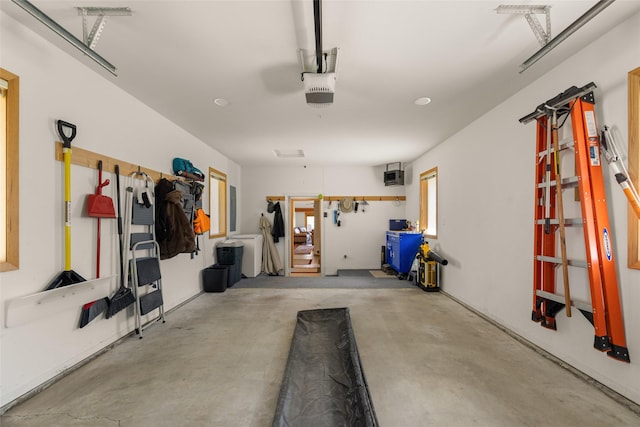 garage featuring french doors and a garage door opener