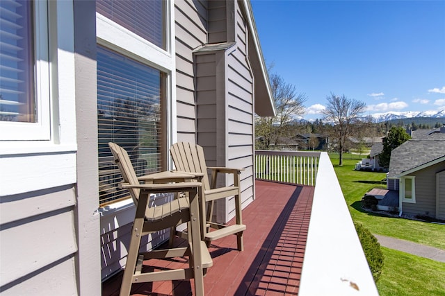balcony featuring a deck with mountain view