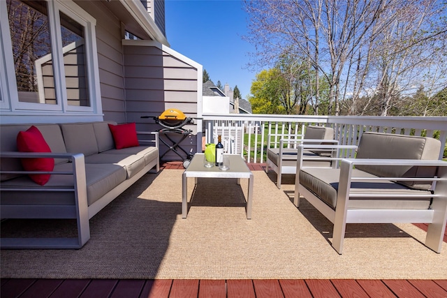 deck featuring outdoor lounge area
