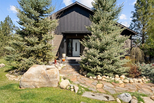 back of house featuring board and batten siding