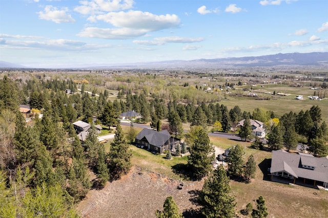 aerial overview of property's location featuring a mountain backdrop