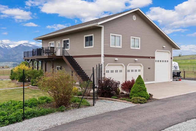 birds eye view of property featuring a rural view and a mountain view