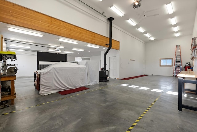 garage with recessed lighting and a garage door opener