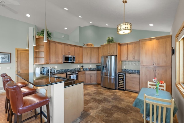 living area with light wood finished floors, beverage cooler, a ceiling fan, high vaulted ceiling, and recessed lighting