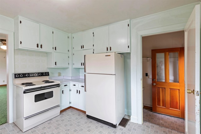kitchen featuring backsplash, light countertops, white cabinets, and white appliances
