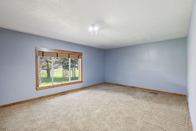 61574 Hillside Rd, Saint Ignatius, MT 59865 - spare room with carpet and baseboards