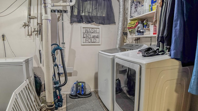 laundry room featuring laundry area and washing machine and dryer