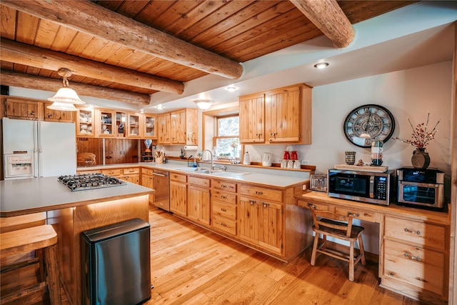 kitchen featuring appliances with stainless steel finishes, wooden ceiling, glass insert cabinets, a sink, and light wood-type flooring