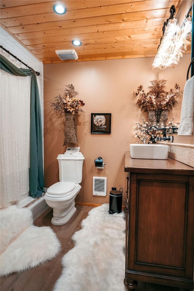 4212 Foothill Rd, Kalispell, MT 59901 - bathroom featuring wooden ceiling, heating unit, and recessed lighting