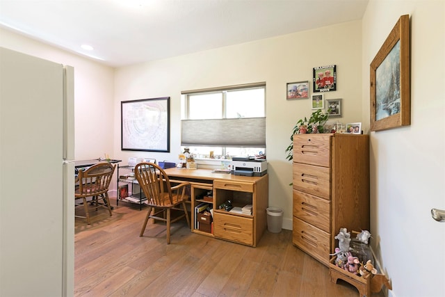 office featuring light wood finished floors and recessed lighting