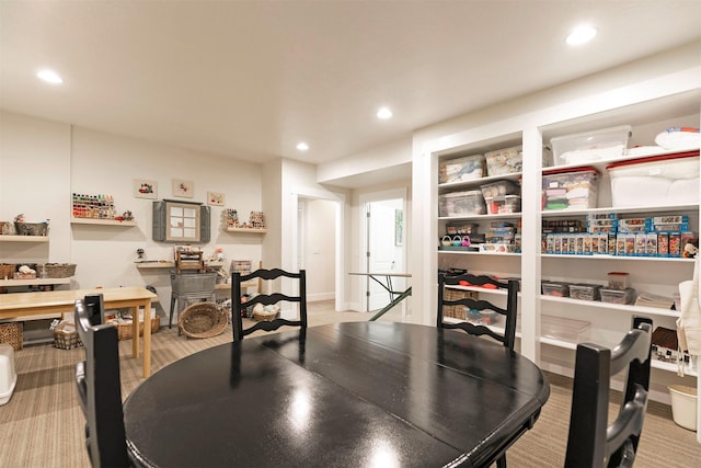 dining area featuring recessed lighting