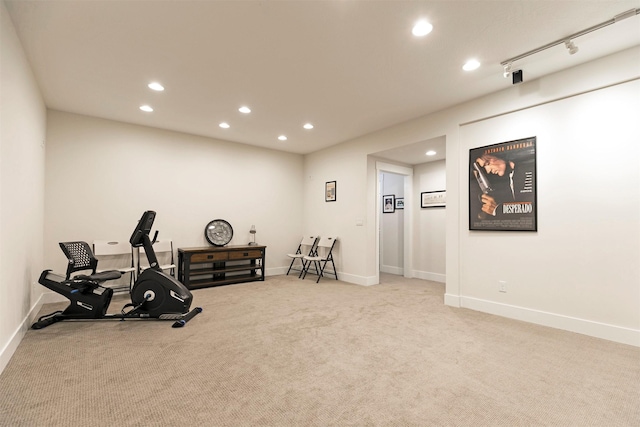 workout area featuring carpet, baseboards, and recessed lighting