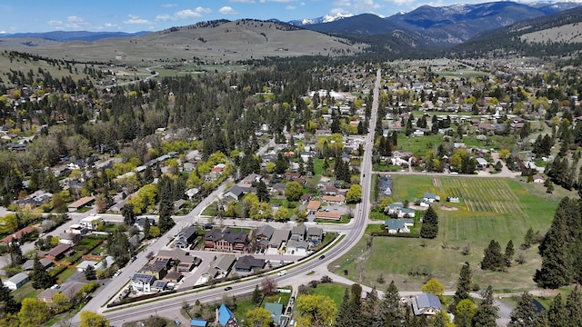 aerial view featuring a mountain view and a residential view