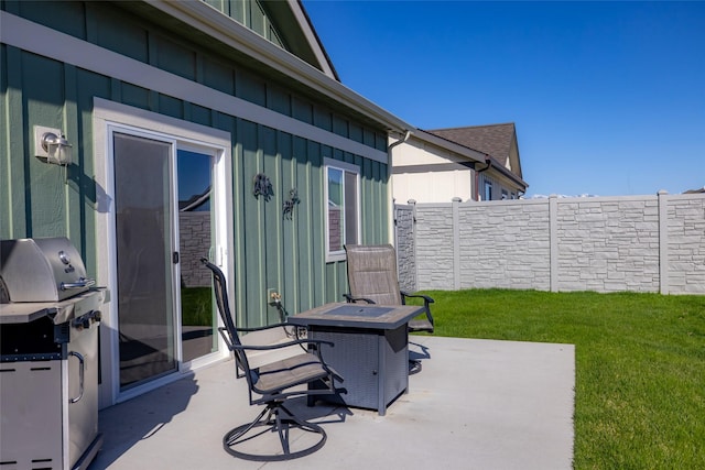 view of patio / terrace with fence and area for grilling