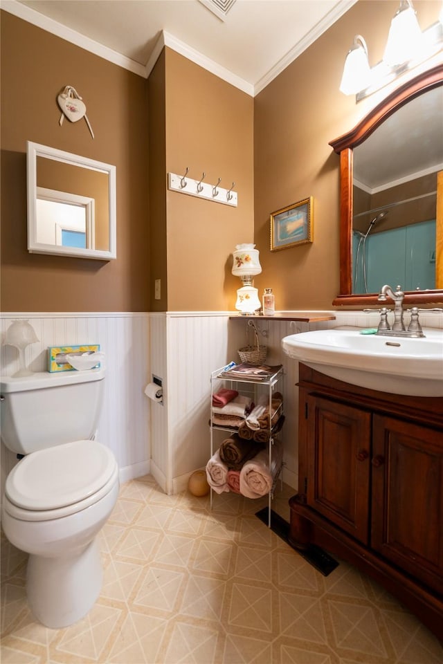 4420 7th Ave S, Great Falls, MT 59405 - full bath featuring toilet, walk in shower, ornamental molding, wainscoting, and vanity