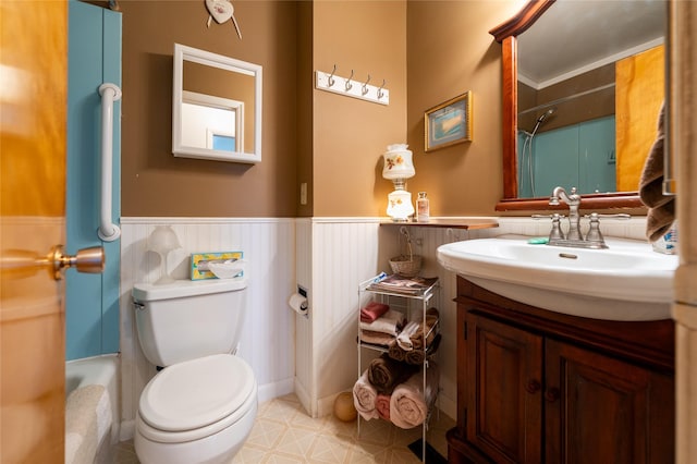 4420 7th Ave S, Great Falls, MT 59405 - full bathroom with toilet, wainscoting, a bath, vanity, and a shower