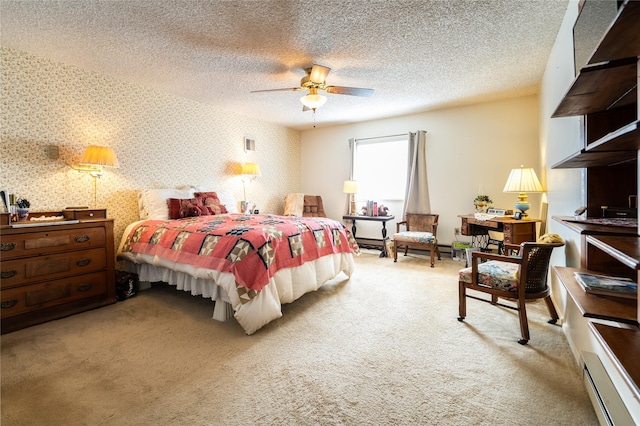 4420 7th Ave S, Great Falls, MT 59405 - bedroom with a textured ceiling, carpet flooring, a ceiling fan, baseboard heating, and wallpapered walls