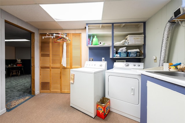 4420 7th Ave S, Great Falls, MT 59405 - clothes washing area featuring light colored carpet, laundry area, and washing machine and clothes dryer