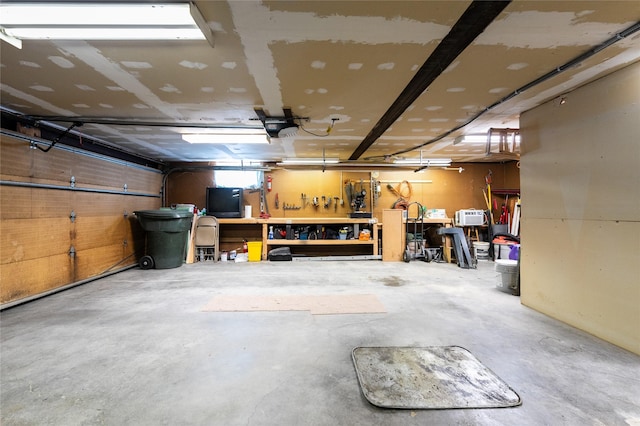 4420 7th Ave S, Great Falls, MT 59405 - garage featuring a workshop area and a garage door opener