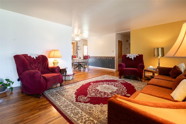 4420 7th Ave S, Great Falls, MT 59405 - living room featuring baseboards and wood finished floors