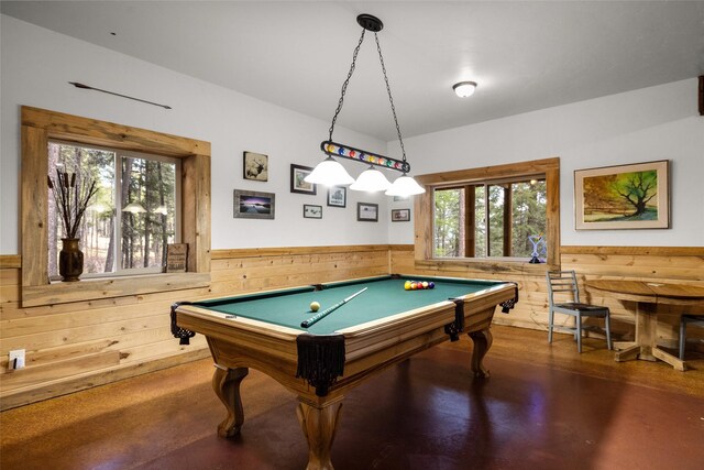 148 Muley Rd, Lakeside, MT 59922 - recreation room featuring wainscoting, wood walls, billiards, and concrete flooring