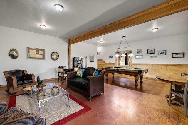 148 Muley Rd, Lakeside, MT 59922 - playroom featuring wooden walls, beam ceiling, concrete floors, and billiards