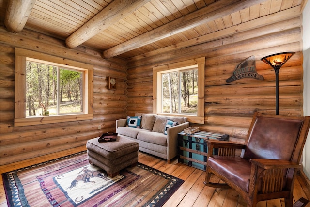148 Muley Rd, Lakeside, MT 59922 - living area featuring wooden ceiling, hardwood / wood-style flooring, a wealth of natural light, and beam ceiling