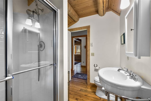 148 Muley Rd, Lakeside, MT 59922 - full bath featuring toilet, lofted ceiling with beams, a stall shower, wooden ceiling, and wood-type flooring