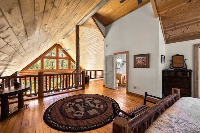 148 Muley Rd, Lakeside, MT 59922 - bedroom with light wood finished floors, high vaulted ceiling, and wooden ceiling