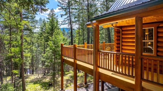 148 Muley Rd, Lakeside, MT 59922 - wooden terrace with a forest view