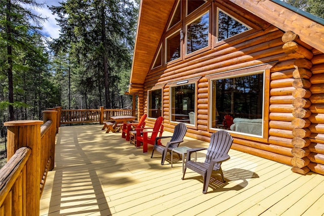 148 Muley Rd, Lakeside, MT 59922 - wooden terrace with outdoor dining space