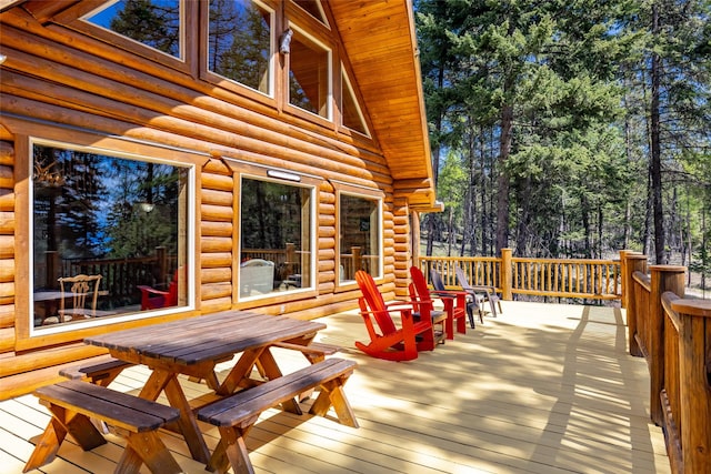 148 Muley Rd, Lakeside, MT 59922 - wooden terrace featuring outdoor dining space