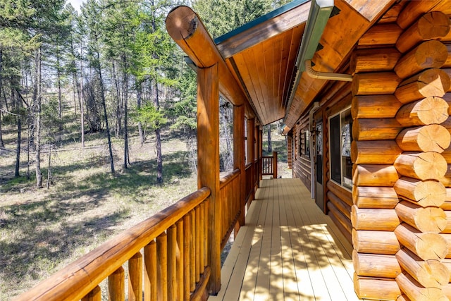 148 Muley Rd, Lakeside, MT 59922 - wooden deck featuring a porch