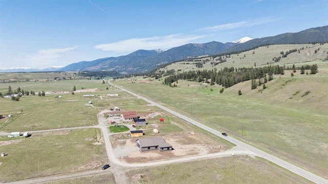 aerial view featuring a rural view and a mountain view