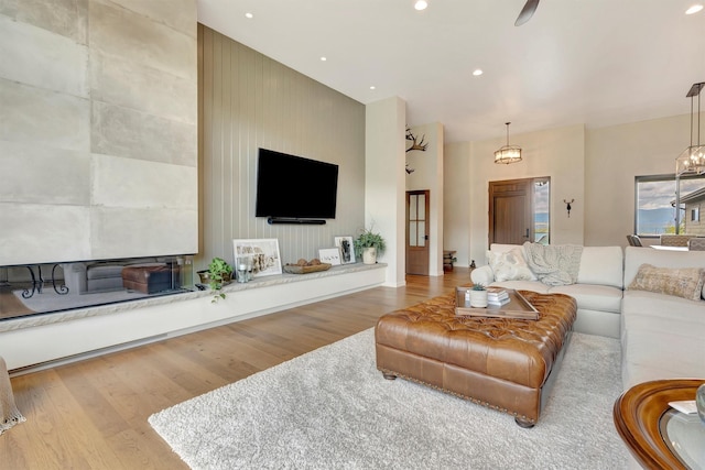 living area featuring recessed lighting and wood finished floors