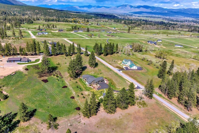 bird's eye view featuring a mountain view and a rural view