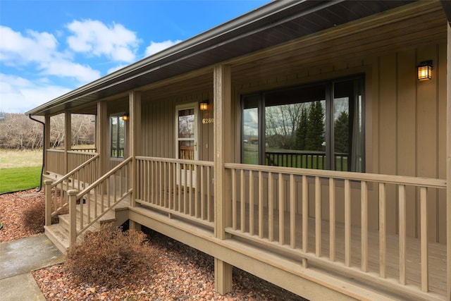 6280 Alamosa Ln, Bozeman, MT 59718 - wooden terrace featuring covered porch
