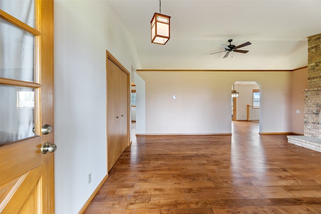 6280 Alamosa Ln, Bozeman, MT 59718 - entryway with vaulted ceiling, light wood-style flooring, ceiling fan, and arched walkways