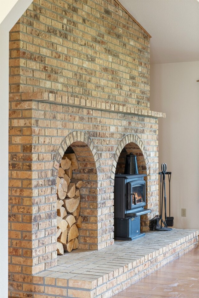 6280 Alamosa Ln, Bozeman, MT 59718 - details with a wood stove and wood finished floors