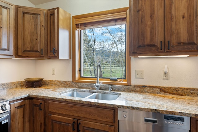 6280 Alamosa Ln, Bozeman, MT 59718 - kitchen with dishwasher, light stone counters, and a sink