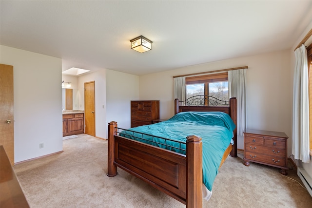 6280 Alamosa Ln, Bozeman, MT 59718 - bedroom with ensuite bath, light carpet, and baseboards