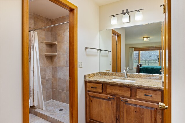 6280 Alamosa Ln, Bozeman, MT 59718 - full bath with connected bathroom, vanity, and tiled shower