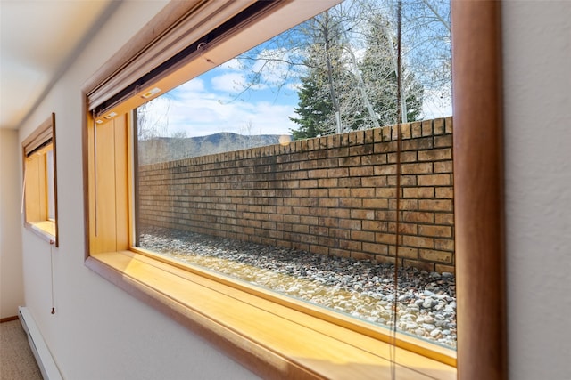 6280 Alamosa Ln, Bozeman, MT 59718 - interior details featuring a mountain view and baseboards