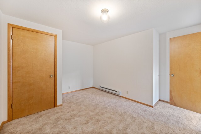 6280 Alamosa Ln, Bozeman, MT 59718 - unfurnished room with carpet flooring, baseboards, and baseboard heating