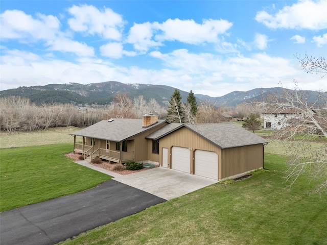 6280 Alamosa Ln, Bozeman, MT 59718 - view of front of property with a shingled roof, covered porch, an attached garage, and a mountain view