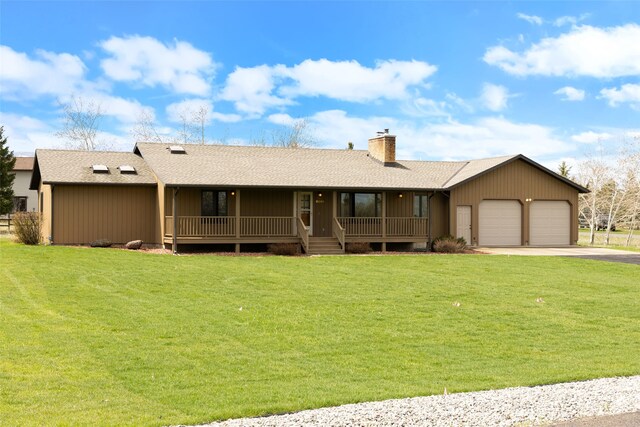 6280 Alamosa Ln, Bozeman, MT 59718 - single story home featuring a garage, a chimney, a front lawn, a porch, and driveway