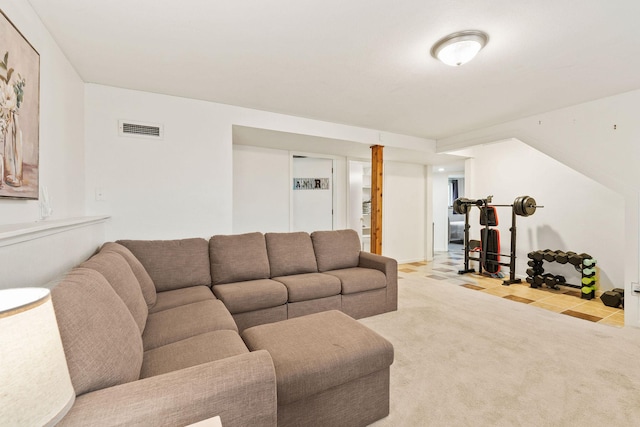 living room with light carpet and visible vents